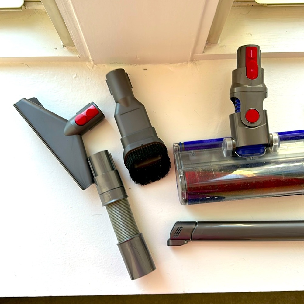 Variety of dyson v8 vacuum attachments. Need cleaned but work great